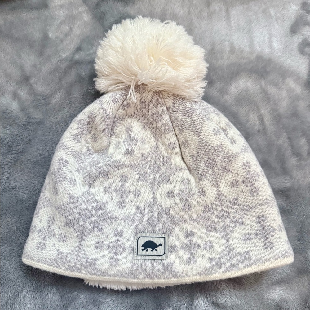 Cozy Cream and Gray Turtle Fur Beanie with Pom Pom
